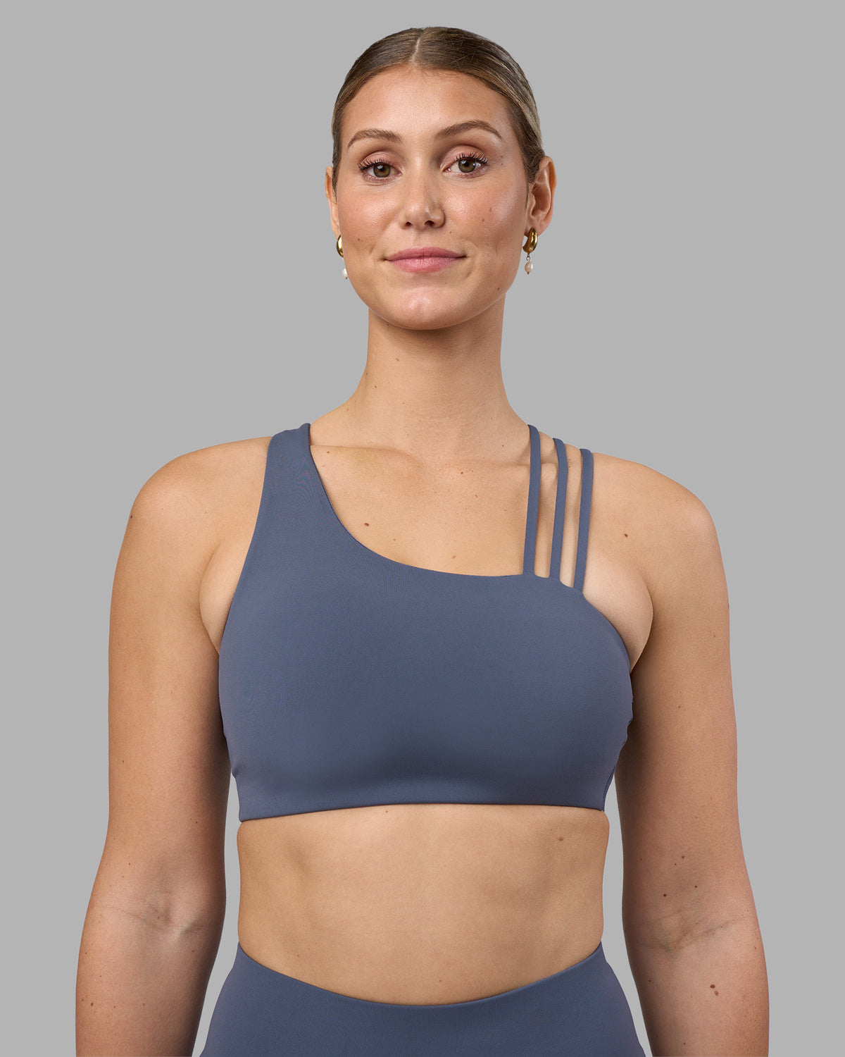 Woman wearing Galvanise Sports Bra 2.0 - Night Shadow | Model:Amy | Size:M