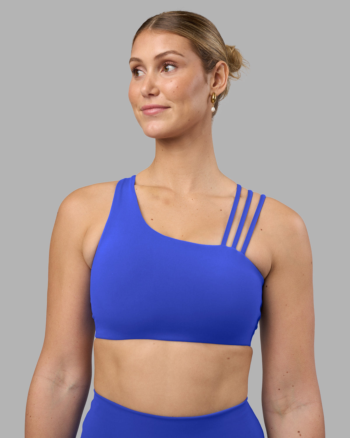 Woman wearing Galvanise Sports Bra 2.0 - Power Cobalt | Model:Amy | Size:M