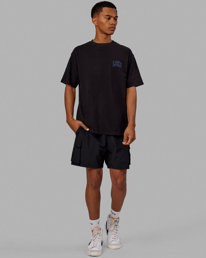 Man wearing Unisex Guild Heavyweight Tee Oversize - Black