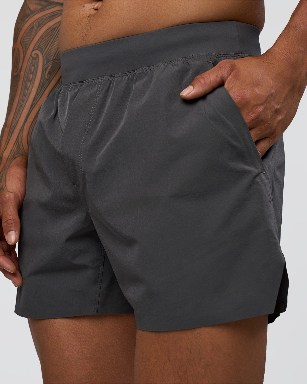 Man wearing Hybrid 5&quot; Short - Dark Storm | Model:Daarian | Size:M