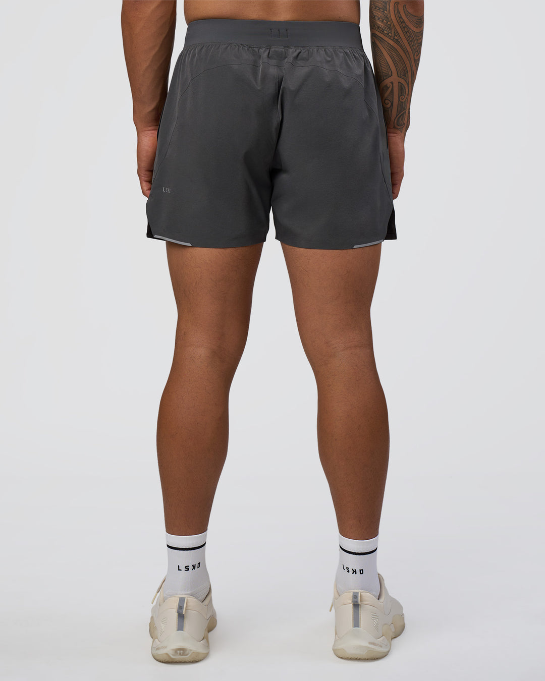 Man wearing Hybrid 5&quot; Short - Dark Storm | Model:Daarian | Size:M