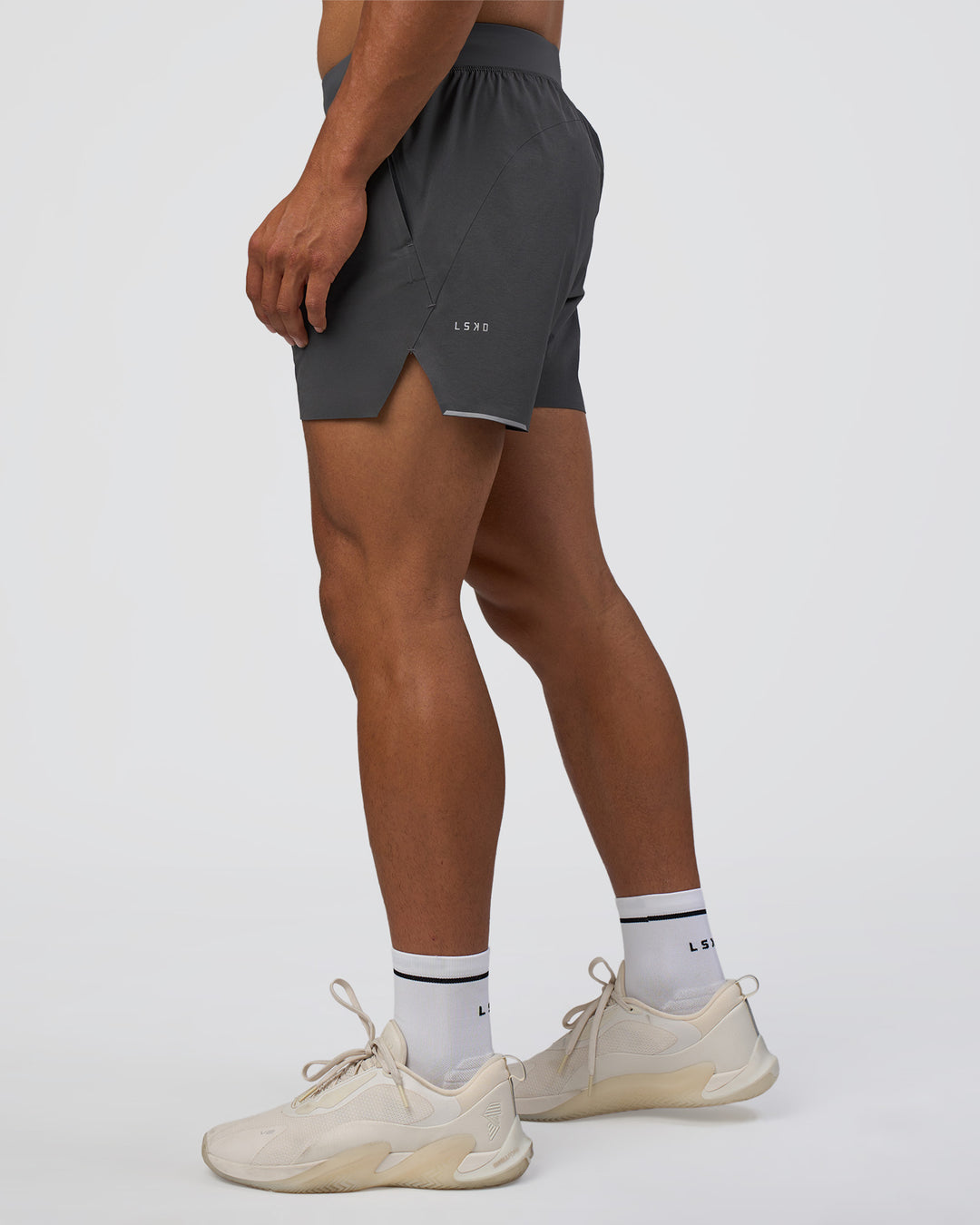 Man wearing Hybrid 5&quot; Short - Dark Storm | Model:Daarian | Size:M