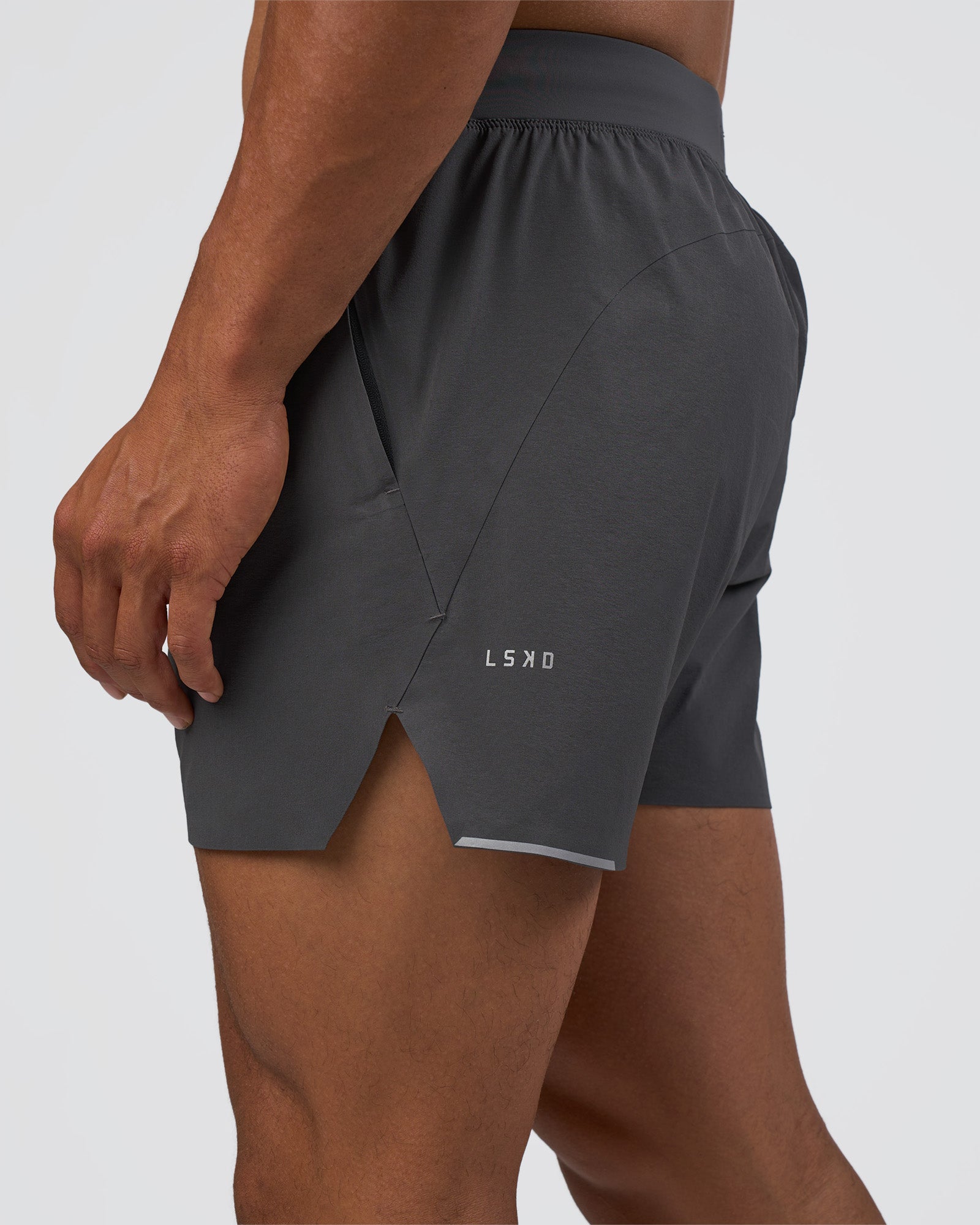 Man wearing Hybrid 5" Short - Dark Storm | Model:Daarian | Size:M