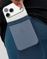 Man wearing Hybrid Lined 5" Short - Black-Indigo | Model:Daarian | Size:M