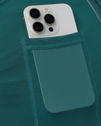 Man wearing Hybrid Lined 5" Short - Transformative Teal | Model:Konnor | Size:M