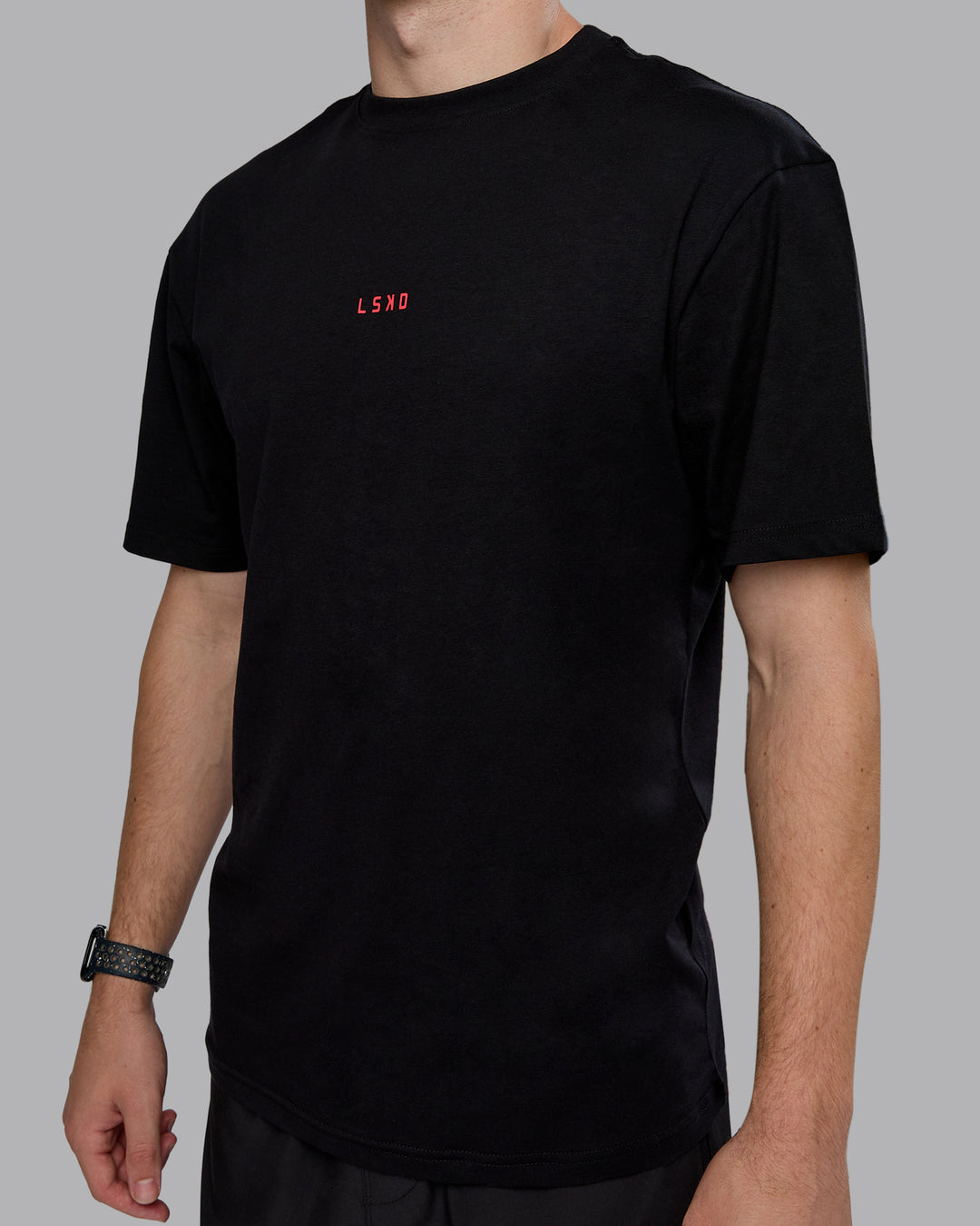 Man wearing Kettlebell Oversized Tee - Black-Scarlet | Model:Cameron | Size:M