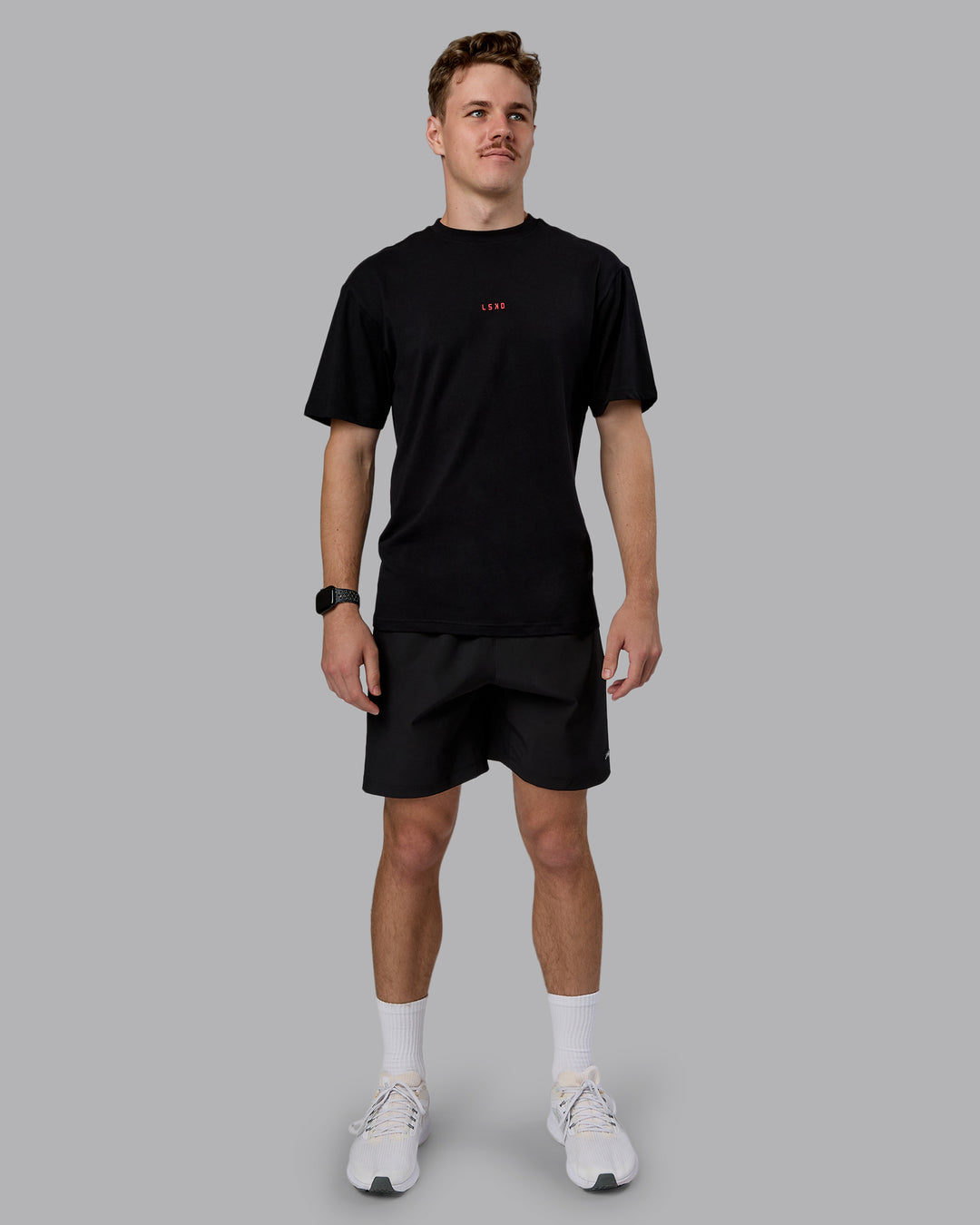 Man wearing Kettlebell Oversized Tee - Black-Scarlet | Model:Cameron | Size:M