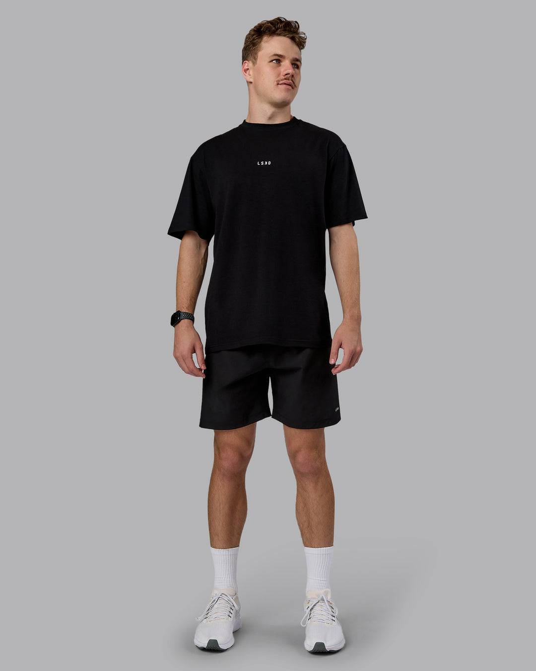Man wearing Kettlebell Oversized Tee - Black-White | Model:Cameron | Size:M