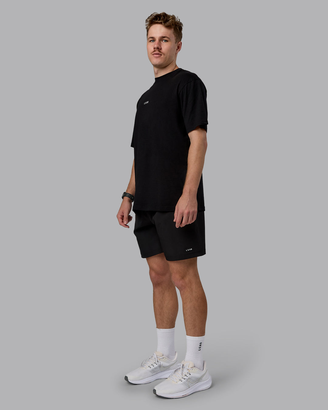 Man wearing Kettlebell Oversized Tee - Black-White | Model:Cameron | Size:M