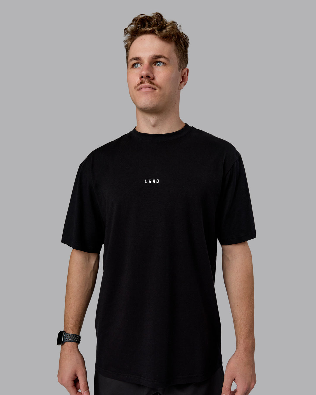 Man wearing Kettlebell Oversized Tee - Black-White | Model:Cameron | Size:M