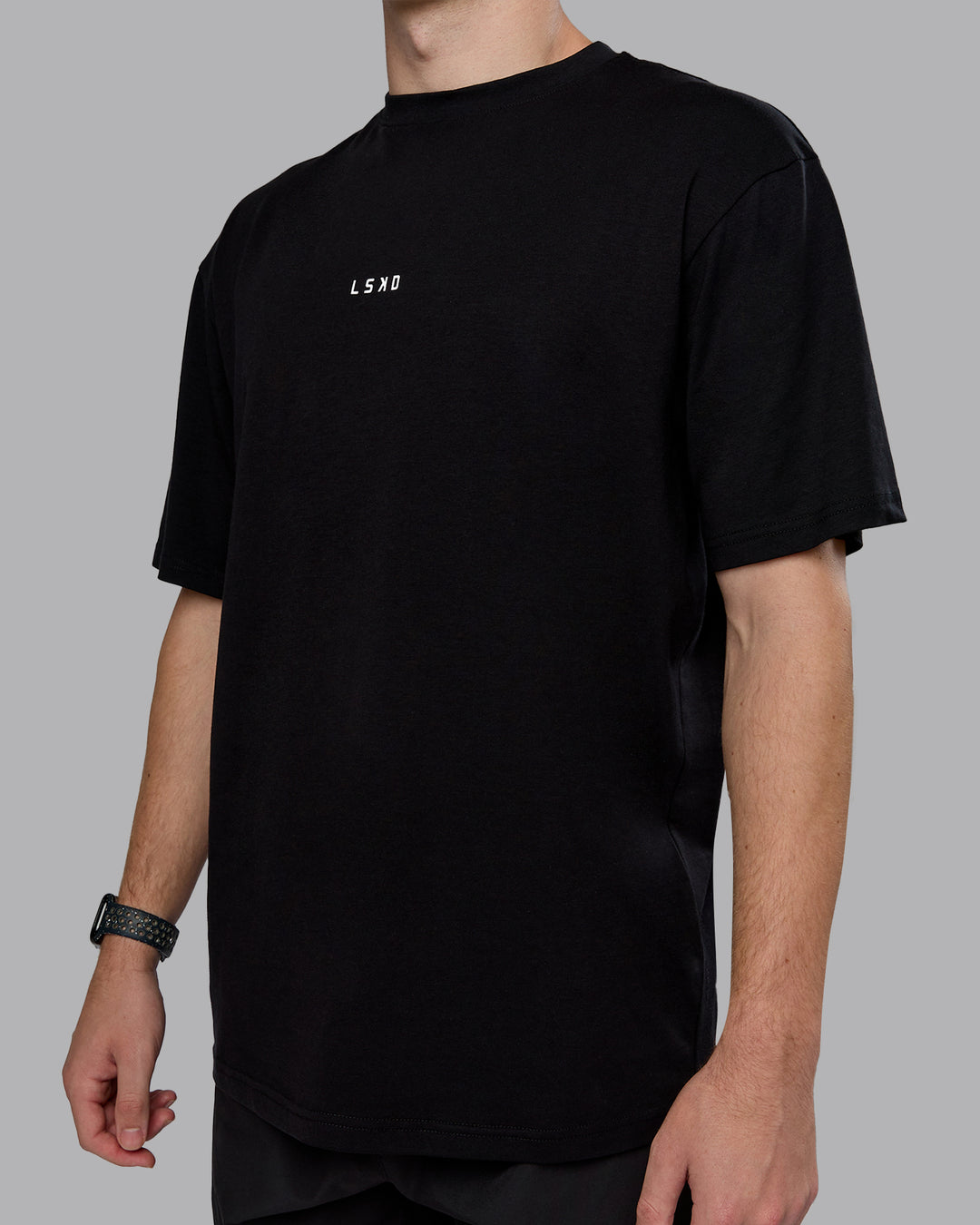 Man wearing Kettlebell Oversized Tee - Black-White | Model:Cameron | Size:M