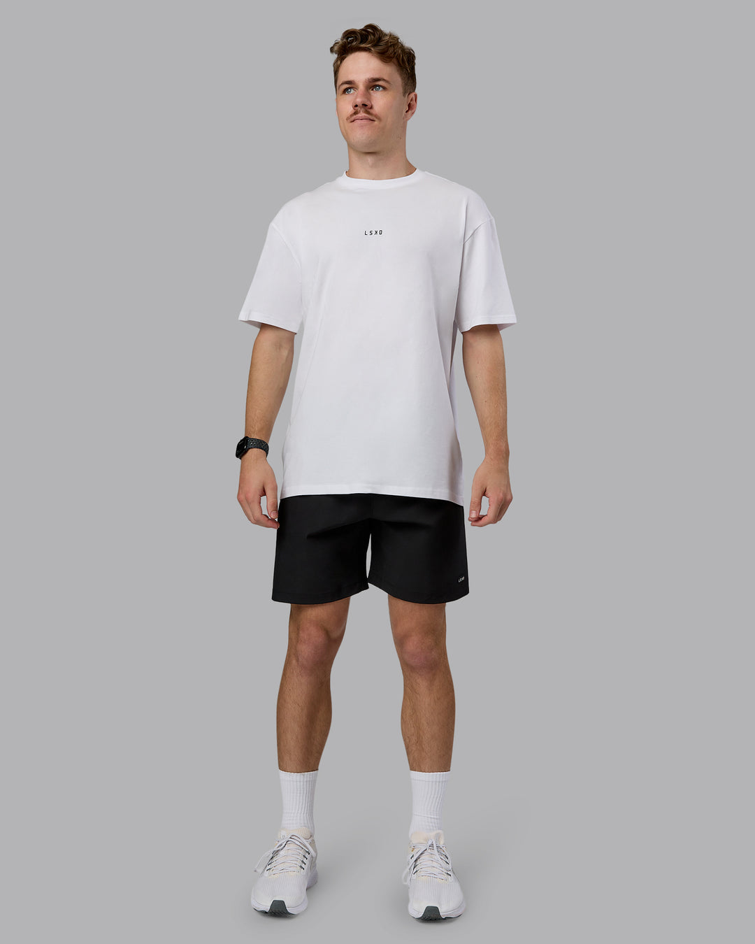 Man wearing Kettlebell Oversized Tee - White-Black | Model:Cameron | Size:M