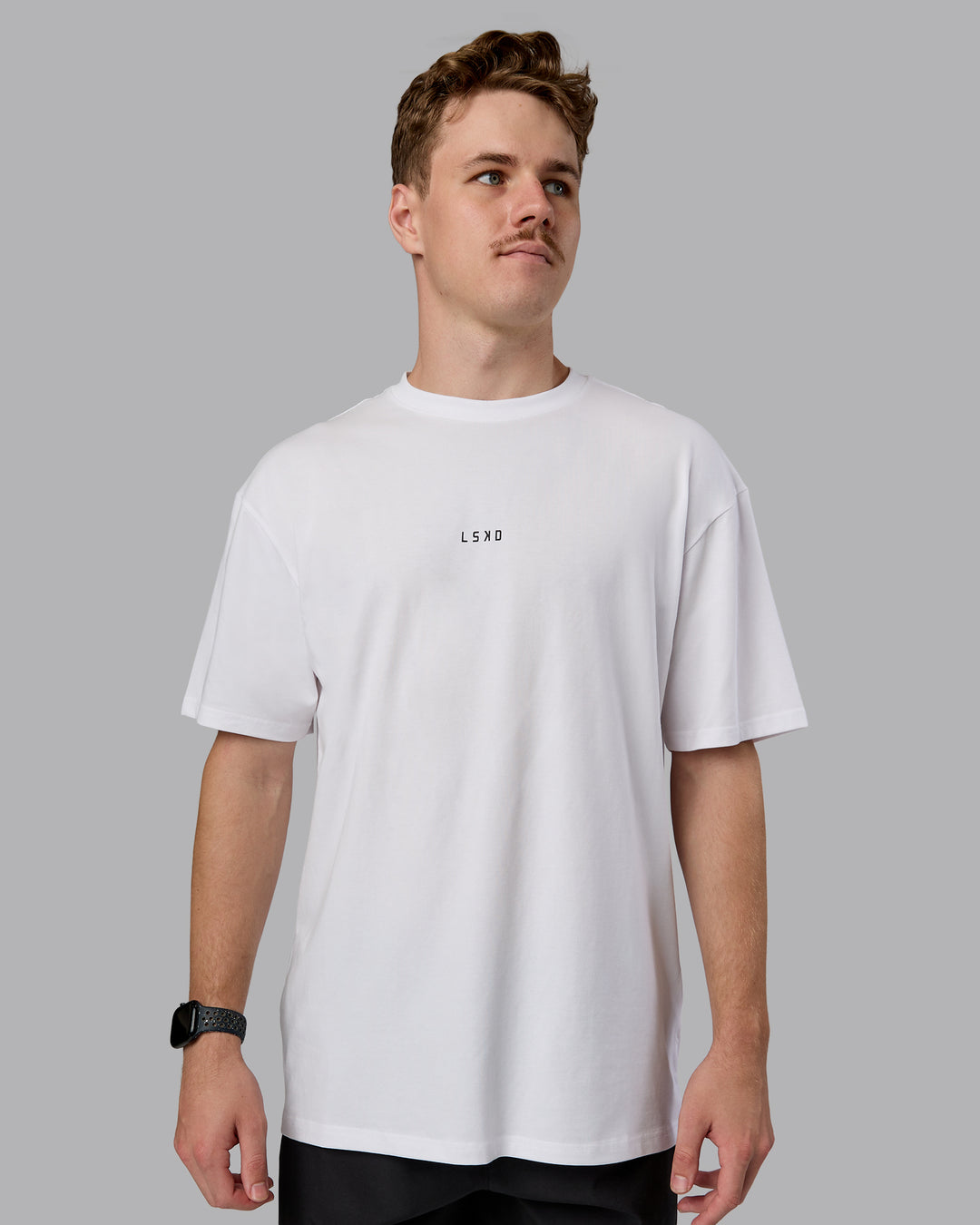 Man wearing Kettlebell Oversized Tee - White-Black | Model:Cameron | Size:M