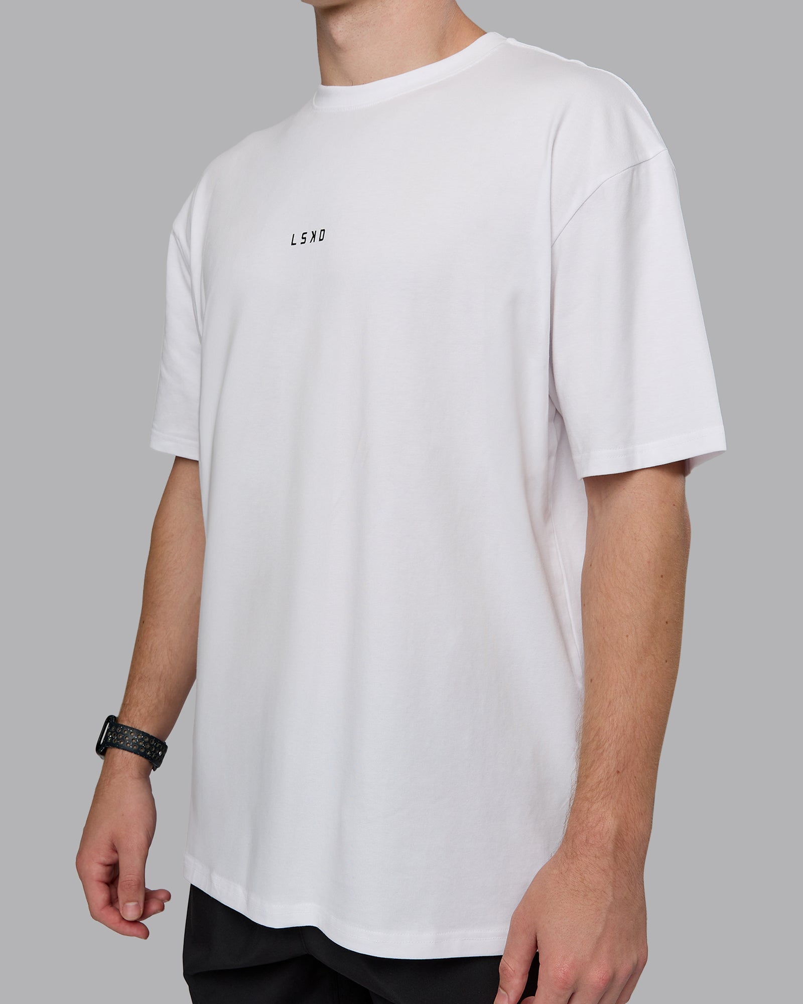 Man wearing Kettlebell Oversized Tee - White-Black | Model:Cameron | Size:M