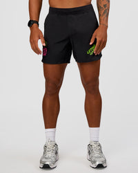 Man wearing Lift 6" Short - Black-Sugar Plum Lime | Model:Malebo | Size:M
