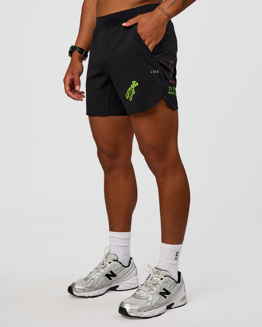 Man wearing Lift 6" Short - Black-Sugar Plum Lime | Model:Malebo | Size:M