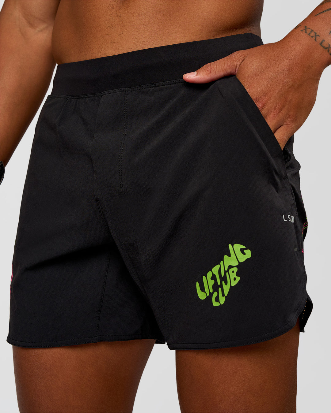 Man wearing Lift 6" Short - Black-Sugar Plum Lime | Model:Malebo | Size:M