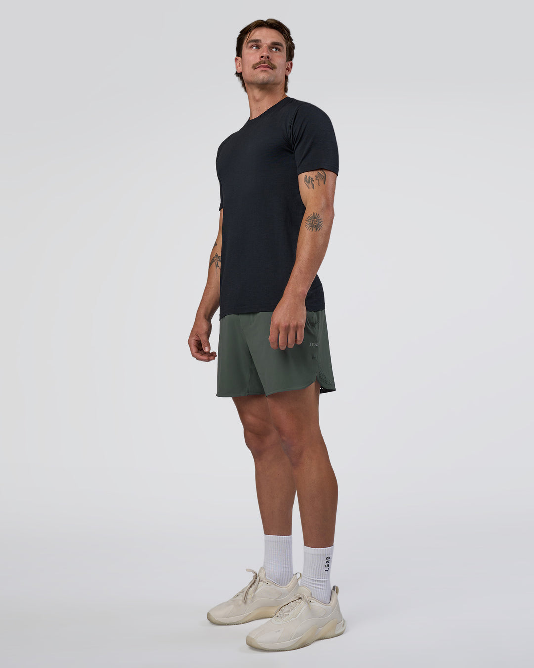 Man wearing Lift 6" Short - Carbon Green | Model:Konnor | Size:M