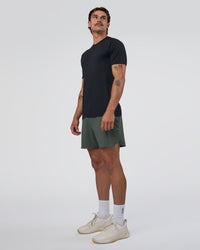 Man wearing Lift 6" Short - Carbon Green | Model:Konnor | Size:M
