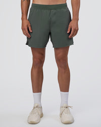 Man wearing Lift 6" Short - Carbon Green | Model:Konnor | Size:M