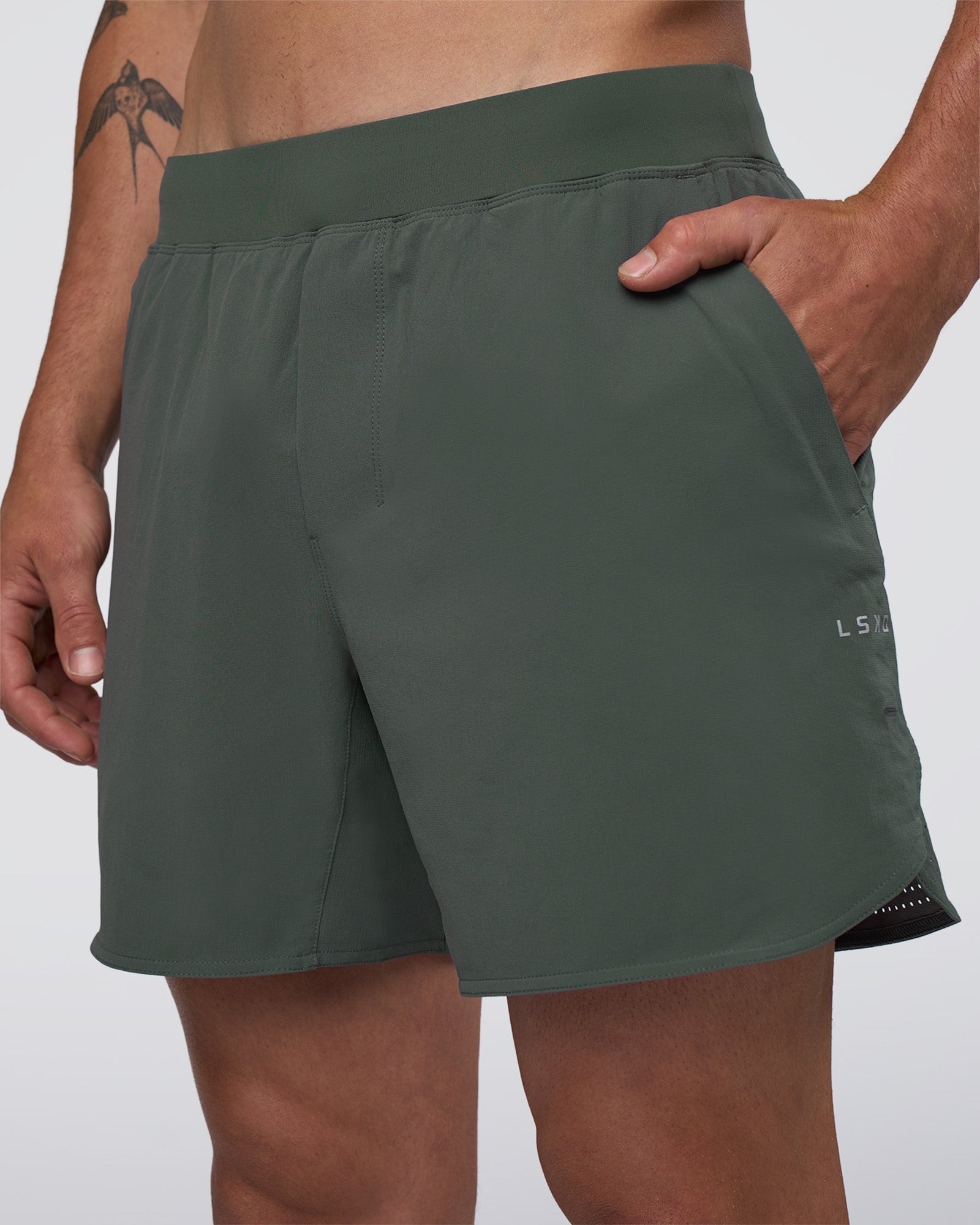 Man wearing Lift 6" Short - Carbon Green | Model:Konnor | Size:M