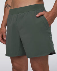 Man wearing Lift 6" Short - Carbon Green | Model:Konnor | Size:M