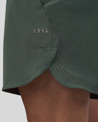 Man wearing Lift 6" Short - Carbon Green | Model:Konnor | Size:M