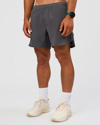 Man wearing Lift 6" Short - Dark Storm | Model:George | Size:M