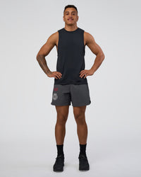 Man wearing Lift 6" Short - Dark Storm-Scarlet | Model:Daarian | Size:M