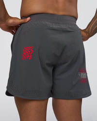 Man wearing Lift 6" Short - Dark Storm-Scarlet | Model:Daarian | Size:M
