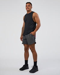 Man wearing Lift 6" Short - Dark Storm-Scarlet | Model:Daarian | Size:M