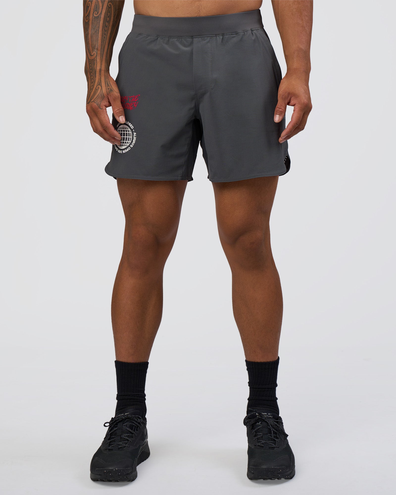Man wearing Lift 6" Short - Dark Storm-Scarlet | Model:Daarian | Size:M
