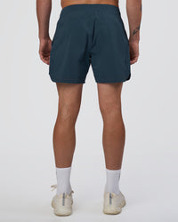 Man wearing Lift 6" Short - Night Sea | Model:Konnor | Size:M