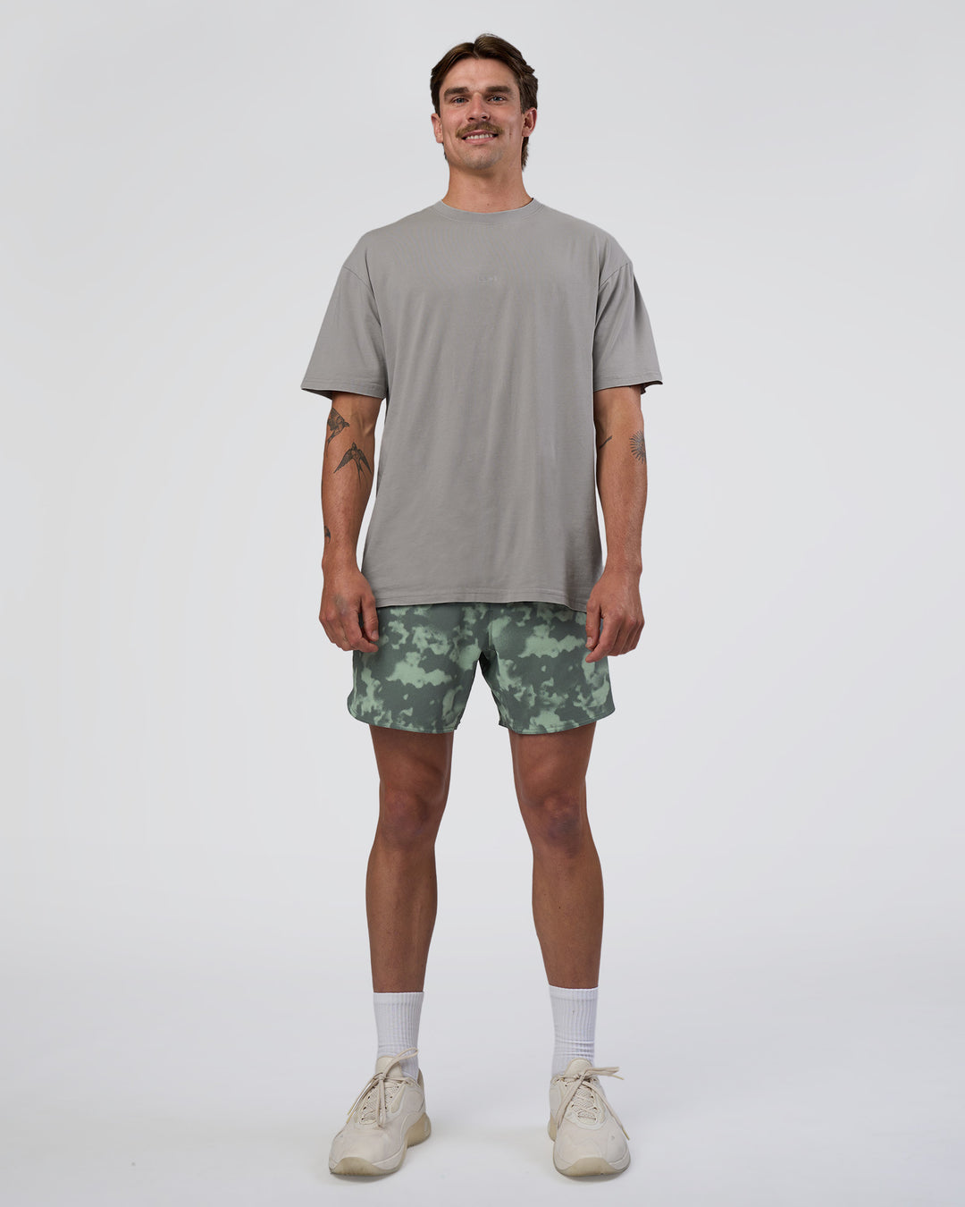 Man wearing Lift 6" Short - Washed Camo Carbon | Model:Konnor | Size:M