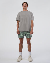Man wearing Lift 6" Short - Washed Camo Carbon | Model:Konnor | Size:M