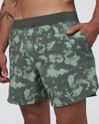 Man wearing Lift 6" Short - Washed Camo Carbon | Model:Konnor | Size:M