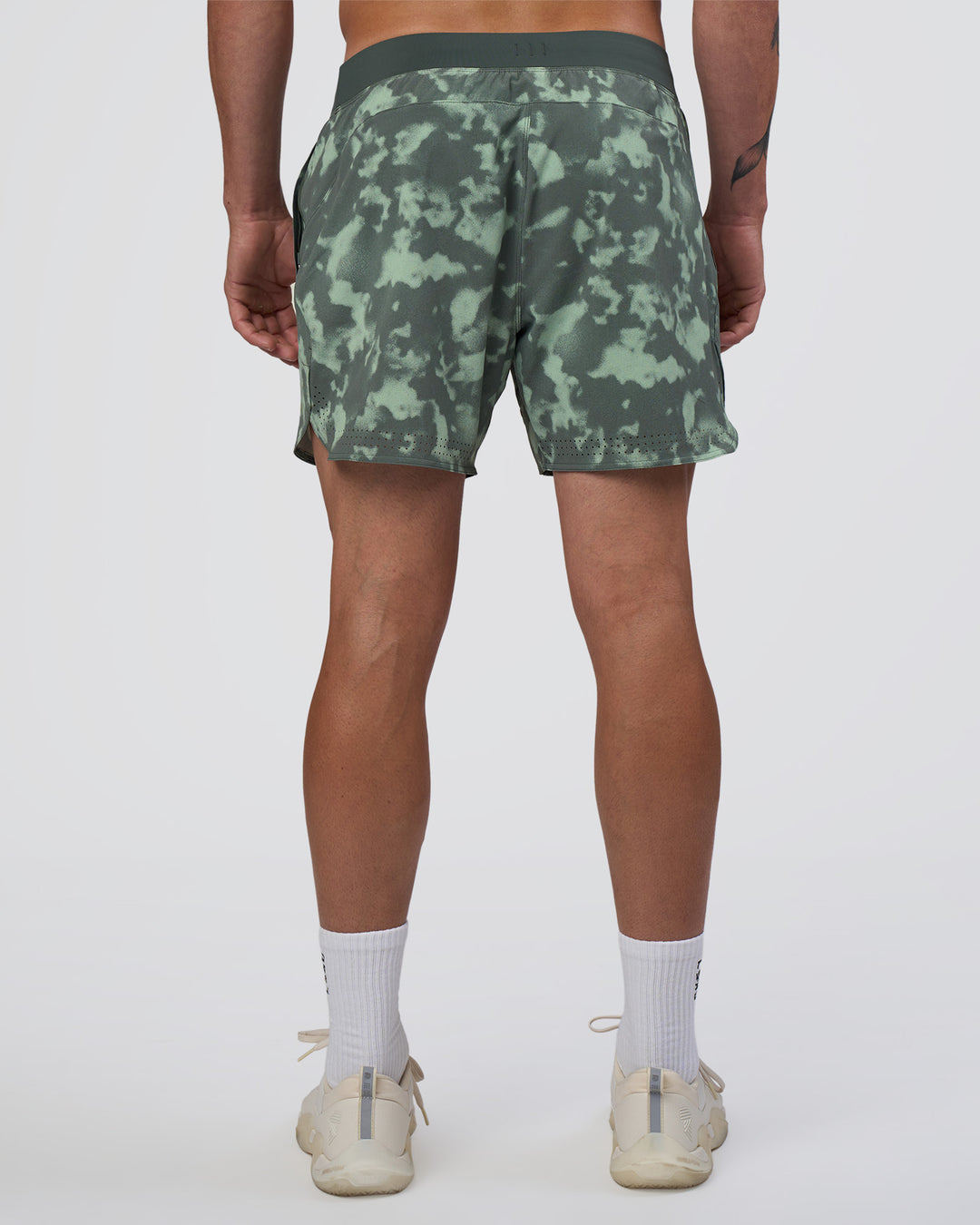 Man wearing Lift 6" Short - Washed Camo Carbon | Model:Konnor | Size:M