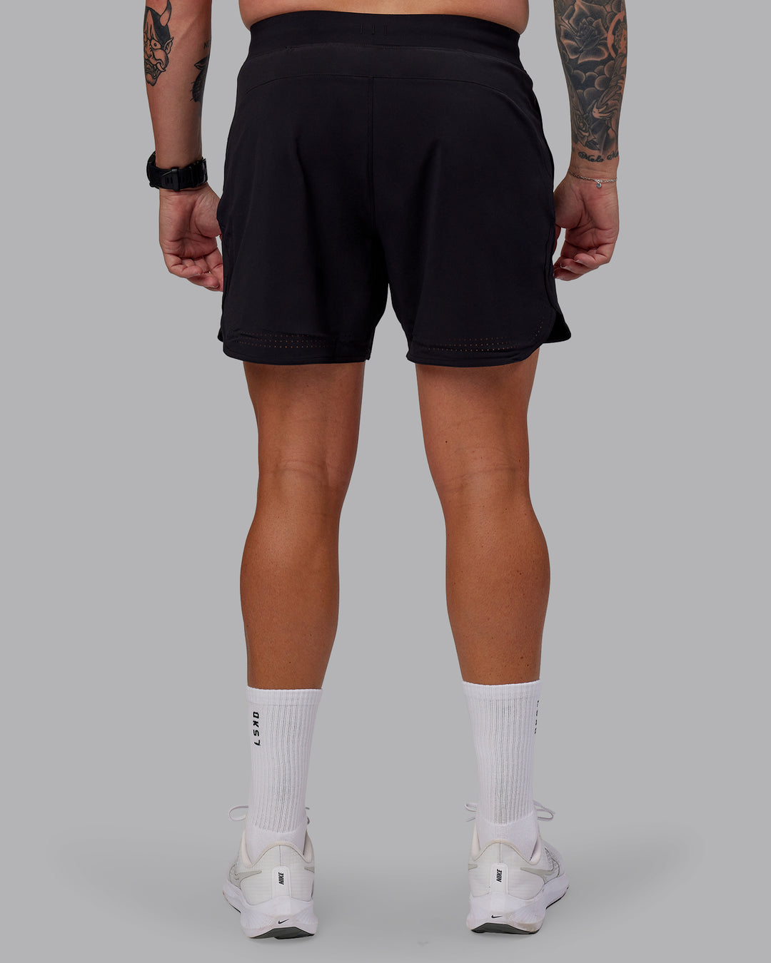 Man wearing Lift Lined 6&quot; Short in Black-Reflective | Size:M