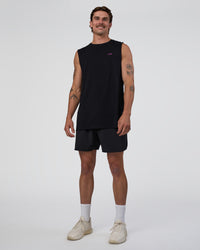 Man wearing Lifting Club FLXCotton Tank - Black-Ultra Fuchsia | Model:Konnor | Size:M