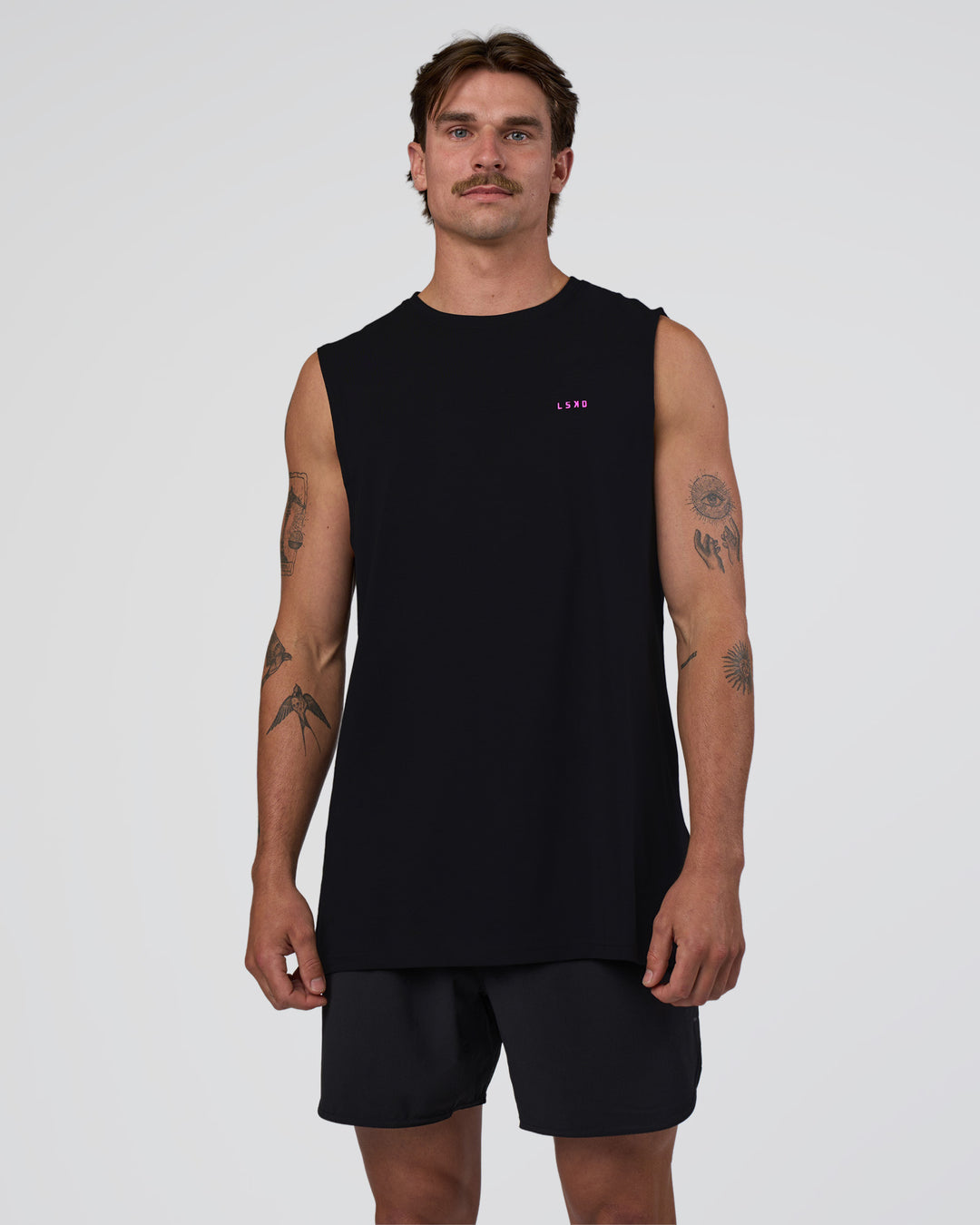 Man wearing Lifting Club FLXCotton Tank - Black-Ultra Fuchsia | Model:Konnor | Size:M