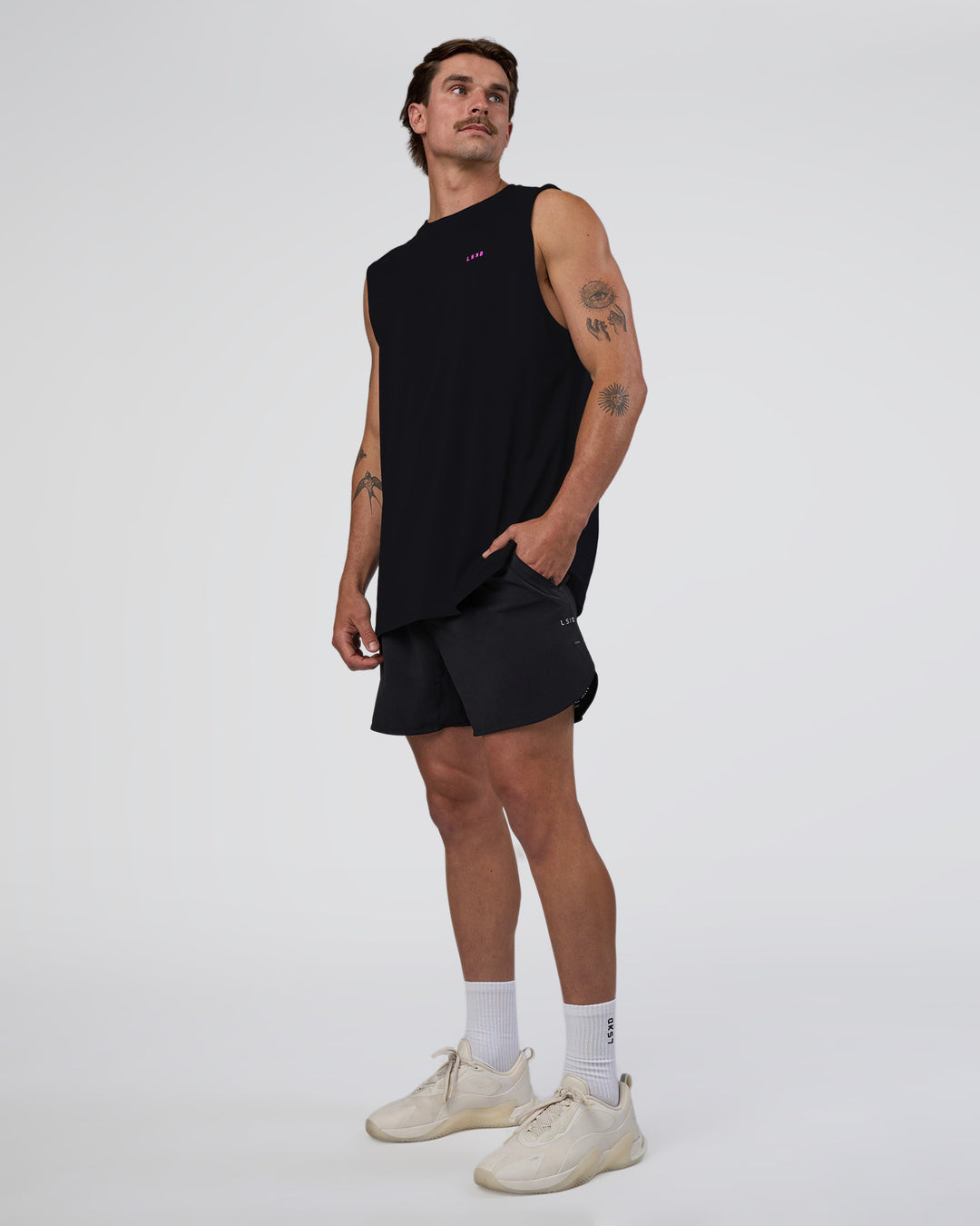 Man wearing Lifting Club FLXCotton Tank - Black-Ultra Fuchsia | Model:Konnor | Size:M