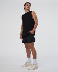 Man wearing Lifting Club FLXCotton Tank - Black-Ultra Fuchsia | Model:Konnor | Size:M