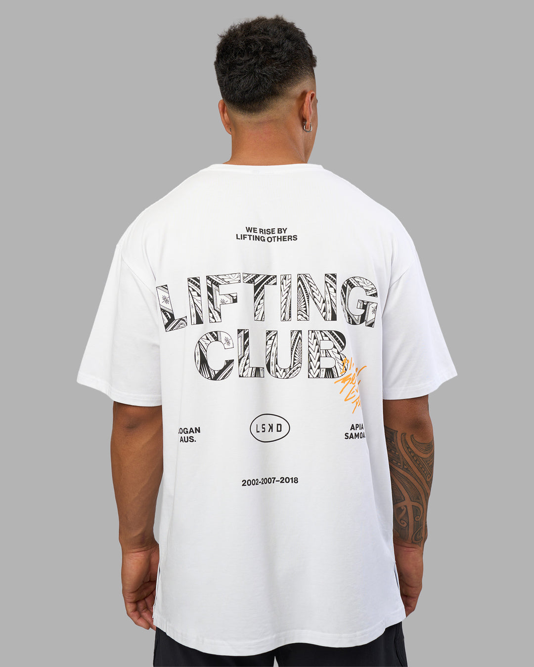 Man wearing Lilz Lifting Club FLXCotton Oversized Tee - White | Model:Daarian | Size:M