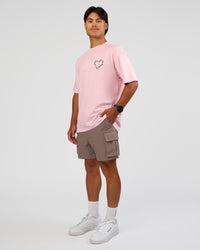Man wearing Love The Process FLXCotton Oversize Tee - Marshmallow-Midnight Plum | Model:George | Size:M