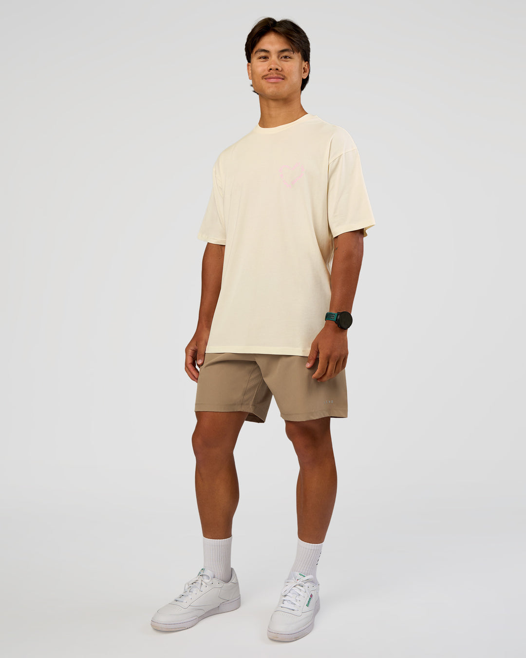 Man wearing Love The Process FLXCotton Oversize Tee - Off White-Marshmallow | Model:George | Size:M