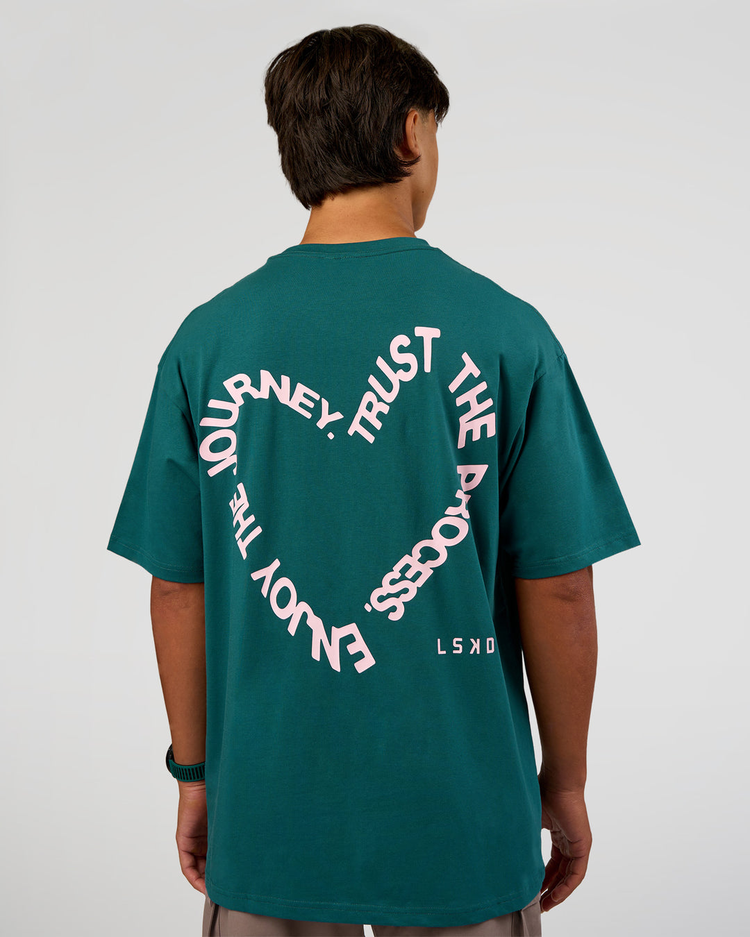 Man wearing Love The Process FLXCotton Oversize Tee - Transformative Teal-Marshmallow | Model:George | Size:M