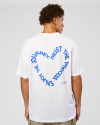 Man wearing Love The Process FLXCotton Oversize Tee - White-Electric Indigo | Model:Leandro | Size:M | Thumbnail Index: 1