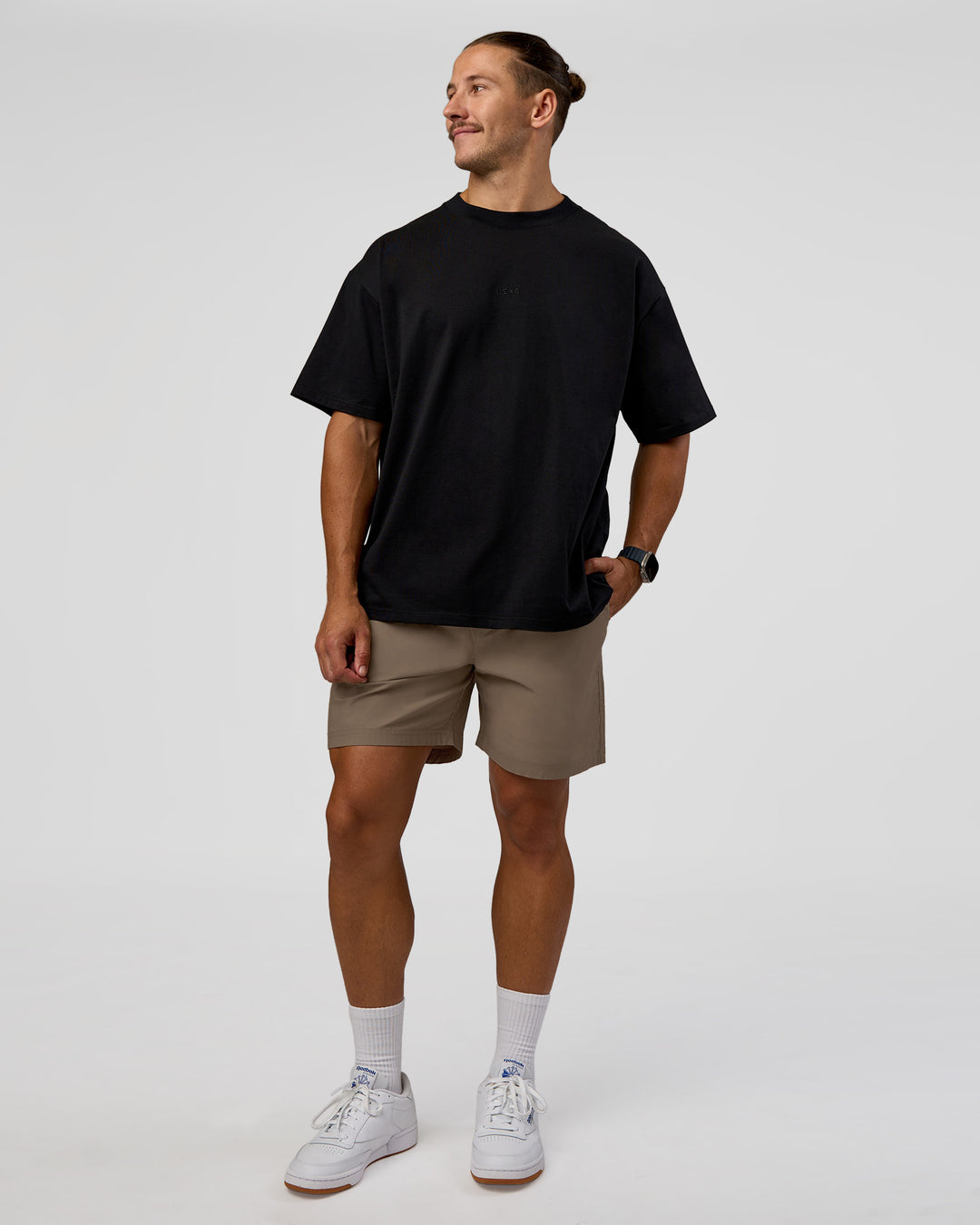 Man wearing MVP 2.0 Oversized Tee - Black | Model:Jaiden | Size:M