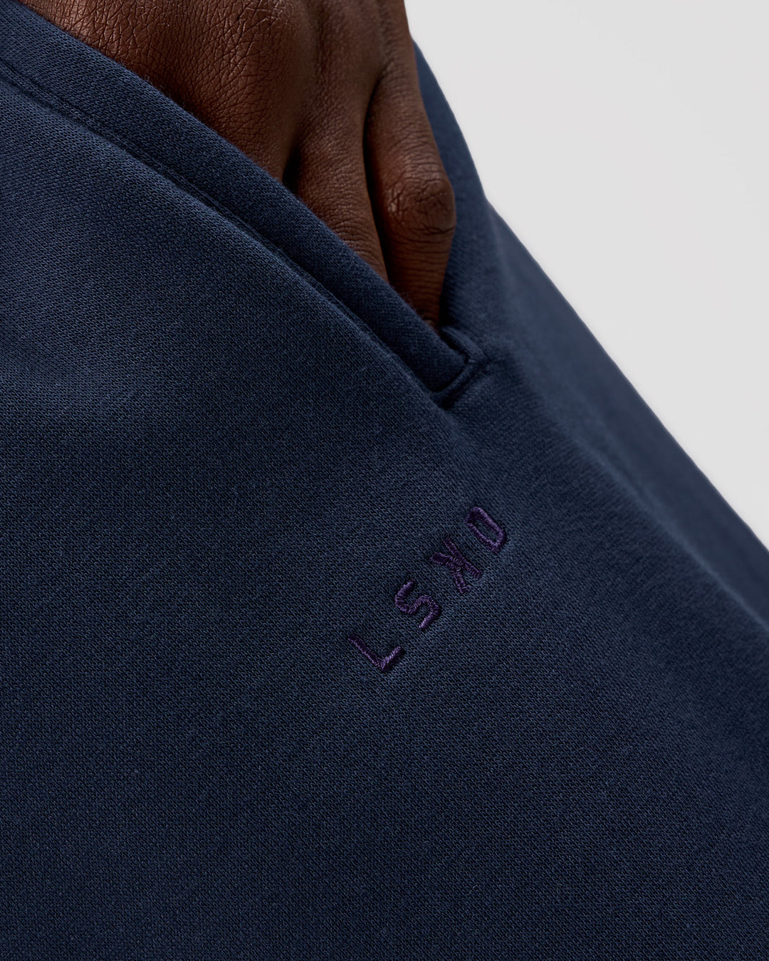 Man wearing MVP Cuffed Track Pant - Future Navy | Model:Okello | Size:M