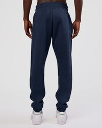 Man wearing MVP Cuffed Track Pant - Future Navy | Model:Okello | Size:M